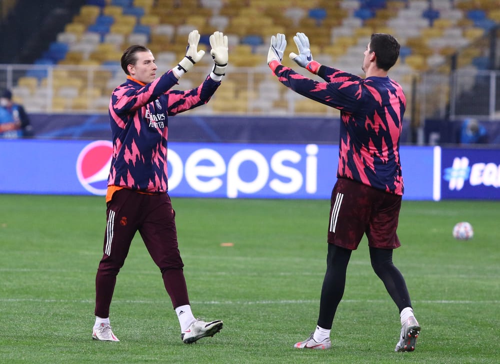 Goalkeepers Andriy Lunin and Thibaut Courtois of Real Madrid in action
