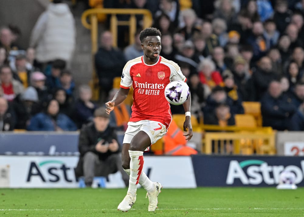 Bukayo Saka of Arsenal chases down the ball.